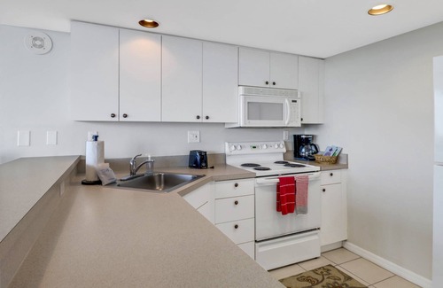 Fort Myers Beach Condo | Stunning 12th Floor Views! Pool & Hot Tub! No Resort Fees & Over $150 of Free Daily Activities!