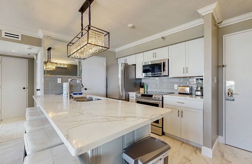 Galveston Condo | Stunning beachfront condo in The San Luis Resort with spa & pool - steps to sand