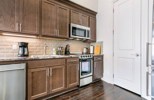 Central Business District Condo | Stunning Canal St Views Steps to Bourbon