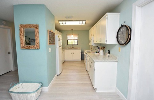 Palm Harbor House | Stunning Fenced Home with Heated Pool & Hot Tub