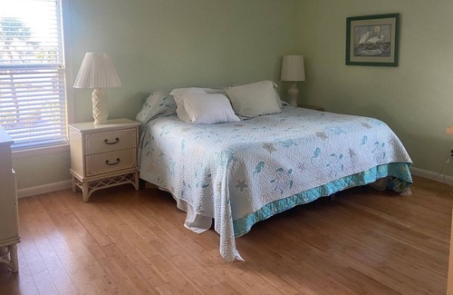 The Dunes House | Stunning golf course views greet you from this sunny home w. pool