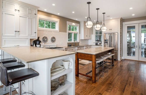 Michiana House | Stunning lakefront home & guest house with pool, beach, terraces, & views