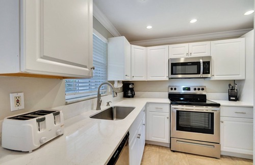 Sanibel Villa | Stunning Luxury canal front villa "Sea Oats" across the street from the beach!