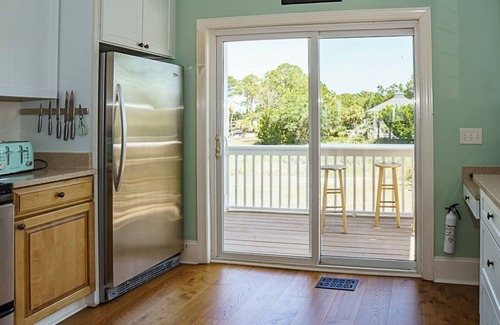 Oceanmarsh Subdivision House | Stunning Marsh Views, 2 Golf Carts Included, 2 Master Suites, expansive decks with ocean breeze
