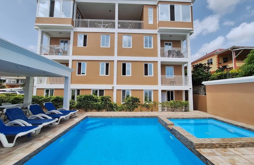 Roseau Apartment | Stunning Ocean & Pool View 2-Bedroom Apartment, 2 mins from the city.
