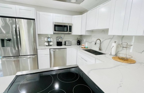 Pompano Beach House | Stunning Poolside Retreat - Half Mile- Short Walk to Beach, Shops & Dining!