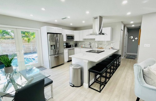 Pompano Beach House | Stunning Poolside Retreat - Half Mile- Short Walk to Beach, Shops & Dining!