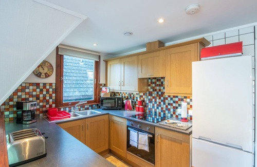 South Laggan House | Stunning private villa for 6 guests with hot tub, WIFI, TV, terrace, pets allowed and panoramic .