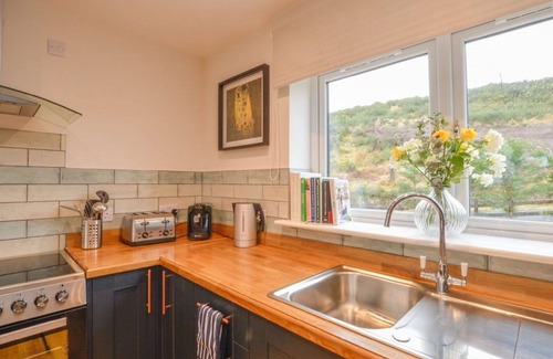 Oban House | Stunning private villa for 6 guests with hot tub, WIFI, TV, patio and pets allowed