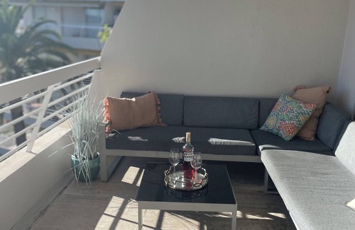 Cap-d'Antibes Apartment | Stunning terrace with view of Cap d' Antibes, yet 2 mins from beach with AC/WiFi