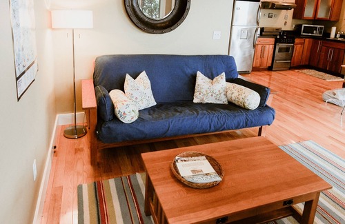 Leland House | Stunning views of Leland Harbor & Fishtown, and sunsets between the Manitou's!