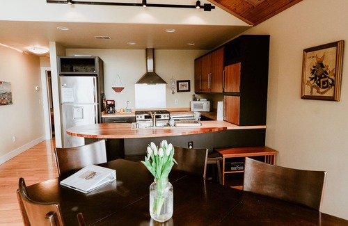 Leland House | Stunning views of Leland Harbor & Fishtown, and sunsets between the Manitou's!