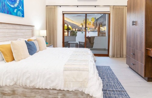 Loreto Villa | Stunning Villa with a highlight rooftop area, heated pool, balcony, & WIFI
