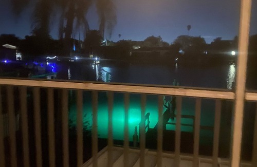 Capri Isle Apartment | "Stunning Waterfront Apartment on Treasure Island with Dock"