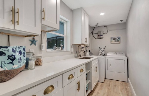 Harbor Hills House | Stunning Waterfront home | Heated Pool | Private Dock | Minutes to Beaches