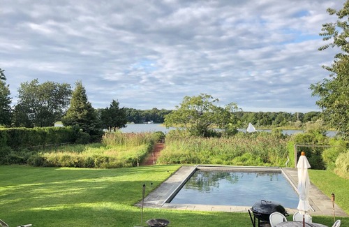 Sag Harbor House | Stunning Waterfront Home with Pool, Boat Dock, and Acre of Land