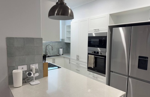 Soldiers Point Apartment | Stylish 2-bed coastal apartment near beach & marina – perfect for relax or work.