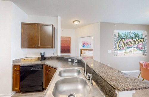 Goose Creek Condo | Stylish 2BR: Pet Friendly in Walkable Resort with a Pool