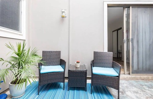 Parker Lane House | Stylish 3‑Bed Townhome w/Private Atrium, Pool & Garage – Near SoCo + Airport+DT