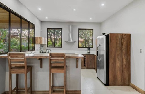 Potrero House | Stylish 3-Bedroom Tropical Escape with Pool & Outdoor Living, 1 Block from Playa