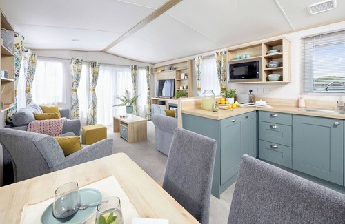 Ludchurch House | Stylish and spacious 12ft-wide caravan with one double and two twin.