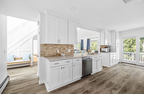 Narragansett House | Stylish coastal retreat w/water views, cozy outdoor firepit &shower, alfresco dining&more!