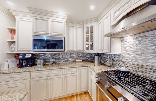 Westbrook Condo | Stylish condo with a high-end kitchen, washer/dryer, & large yard