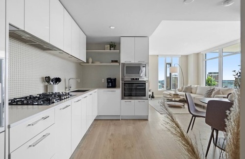 Connaught Condo | Stylish Corner Unit. Views & Comfort. Feel at Home