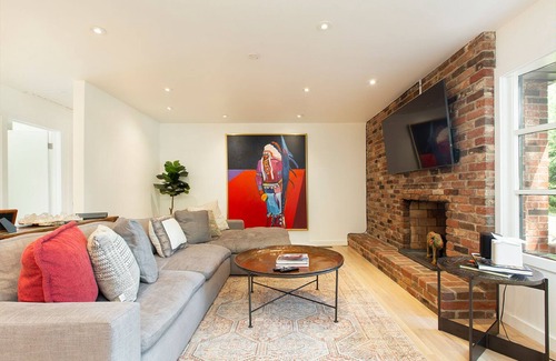 Hendersonville Cottage | Stylish cottage bordering one of the farm's sweeping pastures.