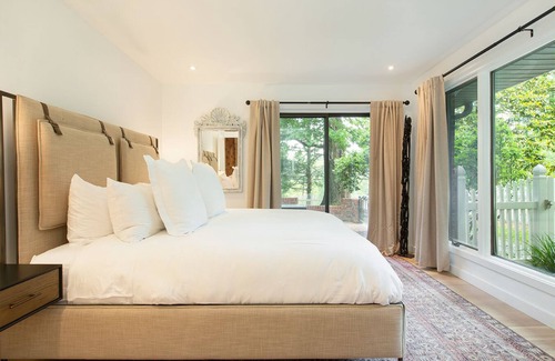 Hendersonville Cottage | Stylish cottage bordering one of the farm's sweeping pastures.