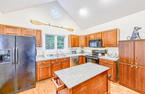 Bumpass House | Stylish dog-friendly gem with kayaks, bikes, deck, firepit, private beach & dock