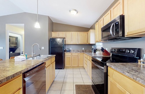 Douglas Condo | Stylish dog-friendly retreat with furnished deck, pool, & firepits