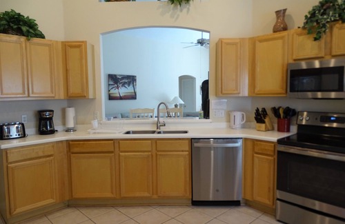 West Haven House | Stylish Ever Popular House with Large Solar Heated Pool/Spa in Gated Community
