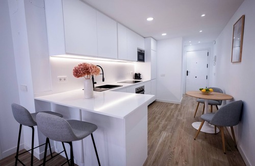 Castillejos Apartment | Stylish High-Floor Retreat with Sunny Terrace