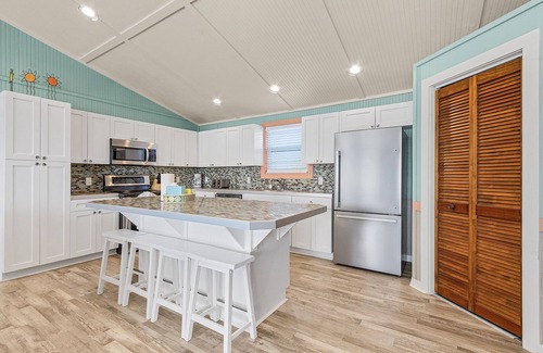 Mid Island House | Stylish Home, Private Heated Pool, Steps to Sugar White Sand Beach!