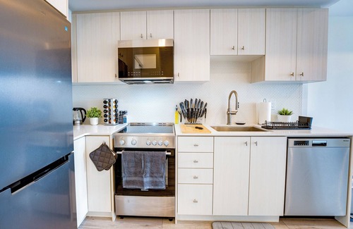 Kitchener Apartment | Stylish Open Concept Condo w/Gym