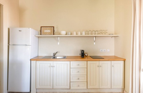 Spartochori Apartment | Stylish, private apartment at village centre, WiFi, pool, walk to amenities