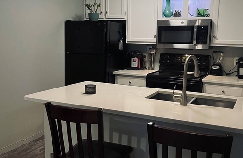 Waters Park Condo | Stylish quiet condo in a great location