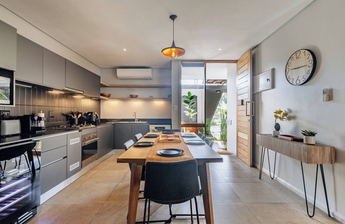 Salt Rock Apartment | Stylish Retreat, Forest, Braai & Back-up Power