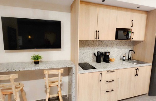 Luis Donaldo Colosio Apartment | Stylish studio, steps to 5th Ave and 2 blocks from the beach/Free parking