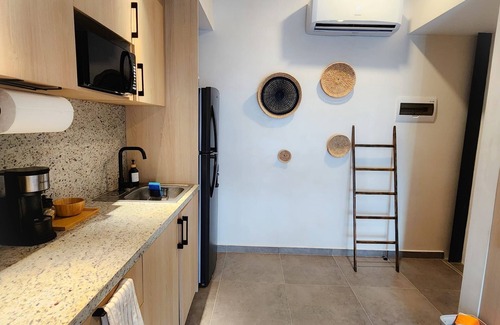 Luis Donaldo Colosio Apartment | Stylish studio, steps to 5th Ave and 2 blocks from the beach/Free parking