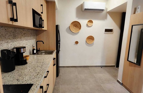 Luis Donaldo Colosio Apartment | Stylish studio, steps to 5th Ave and 2 blocks from the beach/Free parking