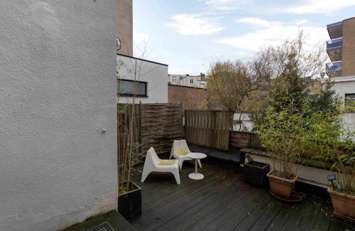 South Antwerp Apartment | Stylish suite with private patio, perfect for 4