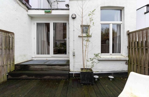 South Antwerp Apartment | Stylish suite with private patio, perfect for 4