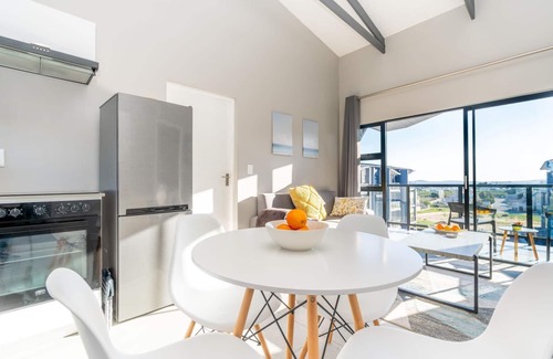 Mykonos Apartment | Stylish Urban Stay | Balcony | Lagoon View