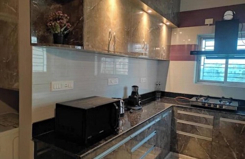 New Town Apartment | Stylo Stays 3 mins drive from Biswa Bangla Gate