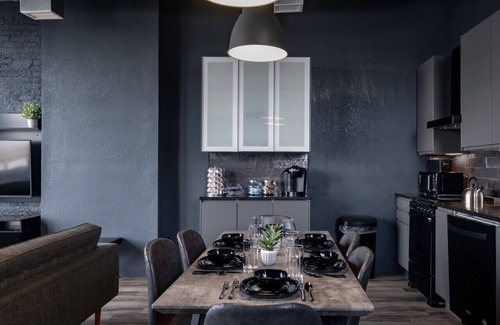 West Main Historic District Condo | Suite 7 City Loft Escape with River Views! By Hollyhock
