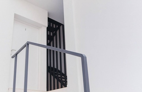 Algeciras Apartment | Suite by Hawkins Interior Low A
