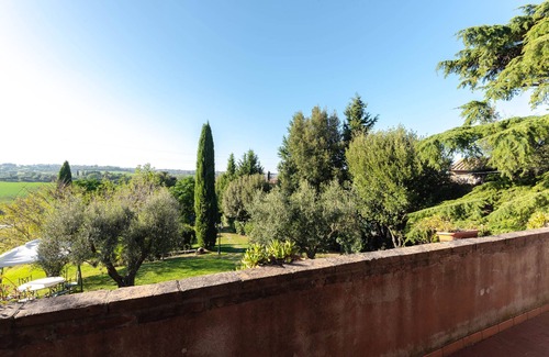 Castiglione del Lago Apartment | Suite with panoramic balcony, pool view and beautiful sunsets