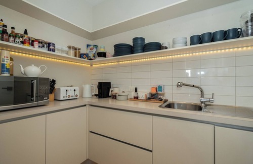 Curlewis House | Summer-Ready Retreat: Sparkling Bay Views, Heated Pool, Fire Pit & Games